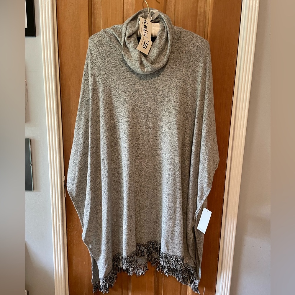 Grey poncho with trim